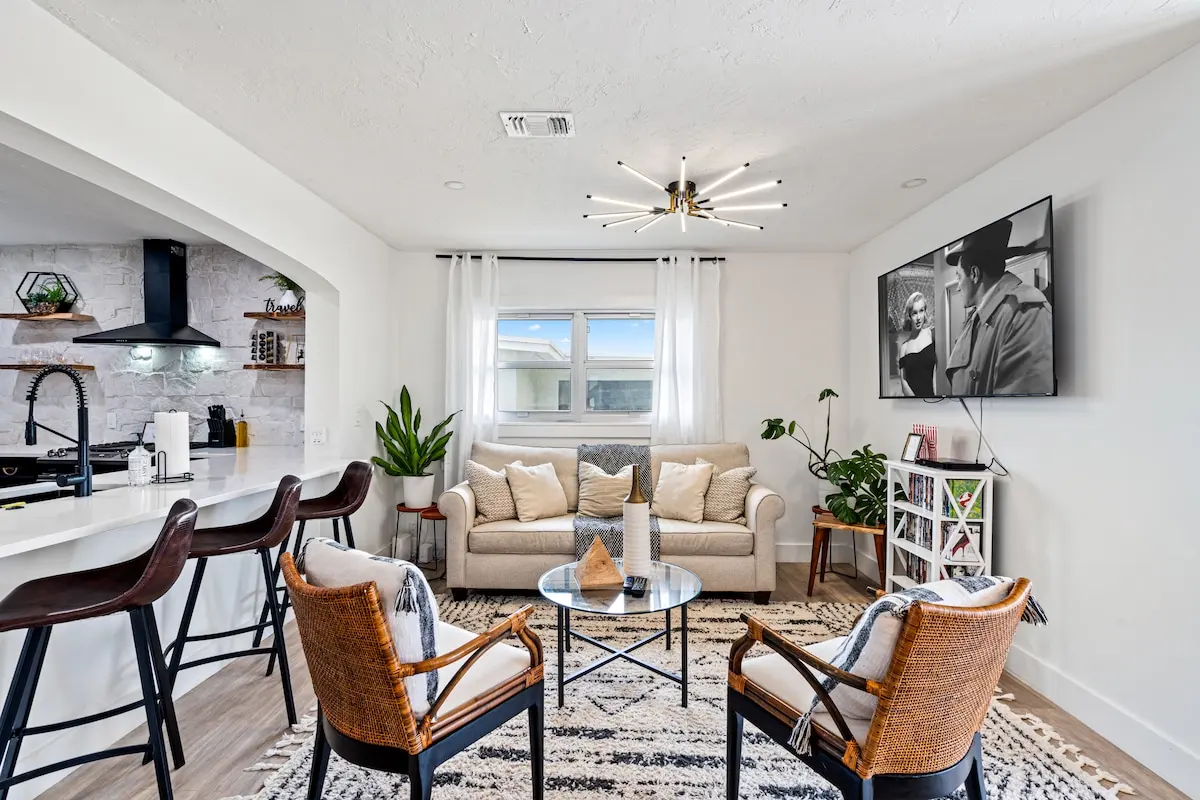 Sink into the cozy living space after a day of exploring. Watch a classic or chat with friends — comfy seating, dreamy lighting, and relaxed vibes await.