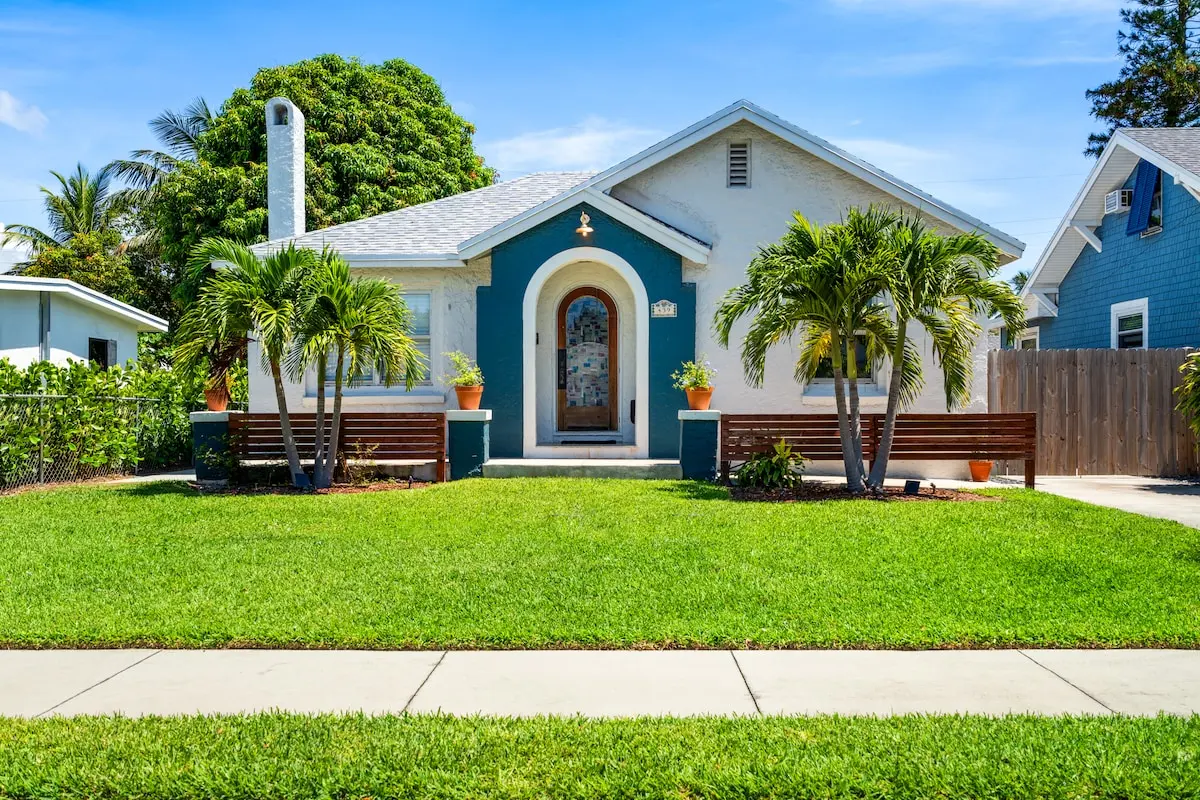 Welcome to your Florida escape! This charming bungalow is wrapped in tropical palms and retro flair — just minutes from beaches, bites, and all the fun.